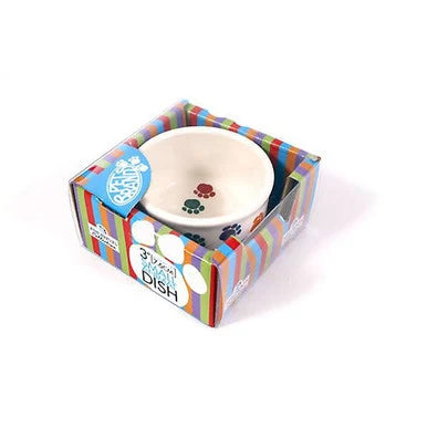 A white ceramic pet bowl decorated with a colorful pattern of paw prints in blue, orange, purple, green, and red, shown.
