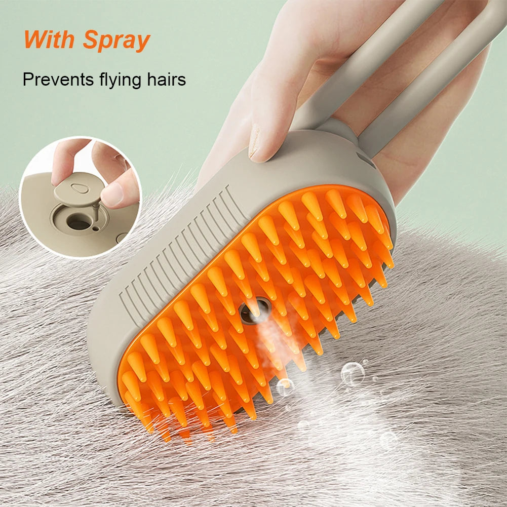 Orange and white 3-in-1 steam pet grooming brush with ergonomic handle