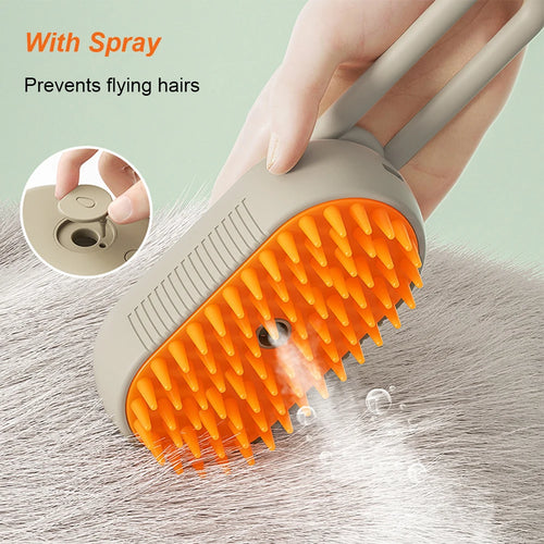 Orange and white 3-in-1 steam pet grooming brush with ergonomic handle